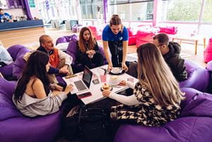 students sitting on beanbags